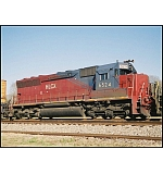 An SD45 shell turned SD40-3 basks in the AM sun.